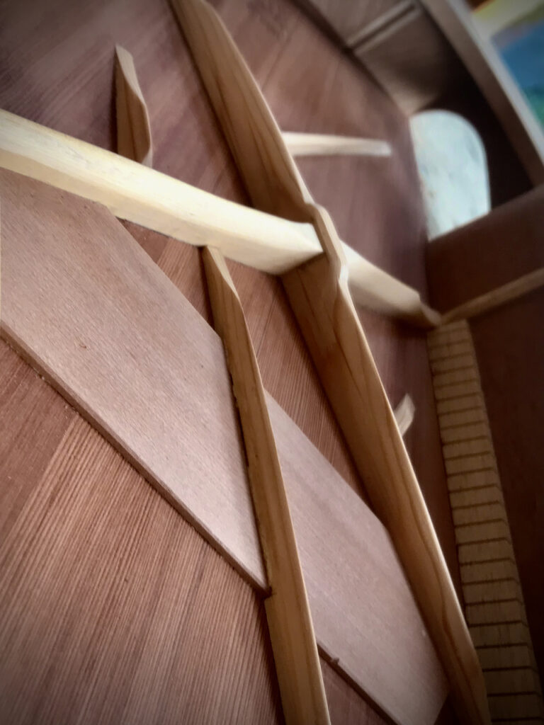 Close up view inside one of Dragonfly Tapping Instruments nylon string acoustic models ... a unique nylon string model for tapping/touchstyle technique