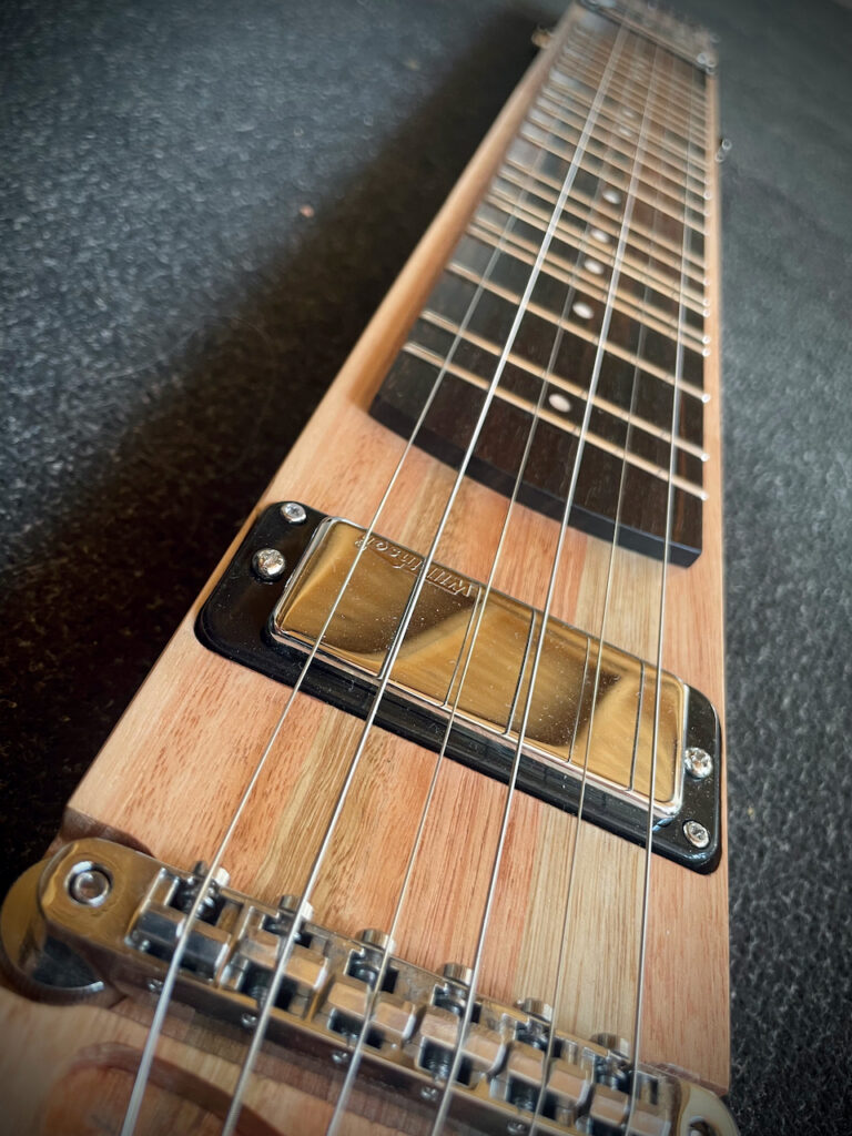 Close up of Dragonfly Tapping Instruments Interval Tapper ... a unique 6 string electric model for tapping/touchstyle that creates 12TET intervals with each tap