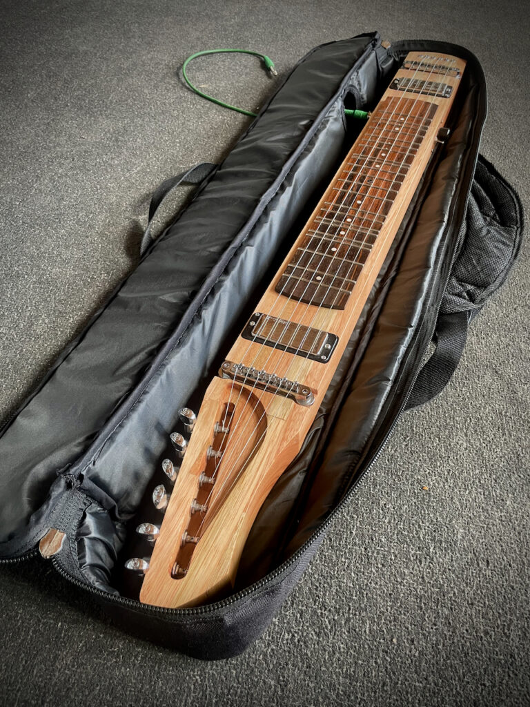 An angled view of Dragonfly Tapping Instruments Interval Tapper model ... a unique 6 string electric model for tapping/touchstyle that creates intervals with each tap